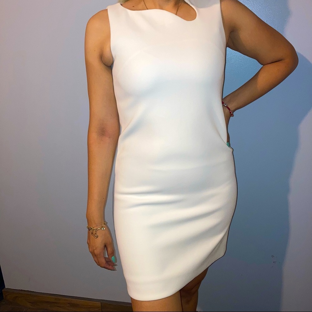 Victoria Beckham Sleeveless White Dress With Unique Neckline.